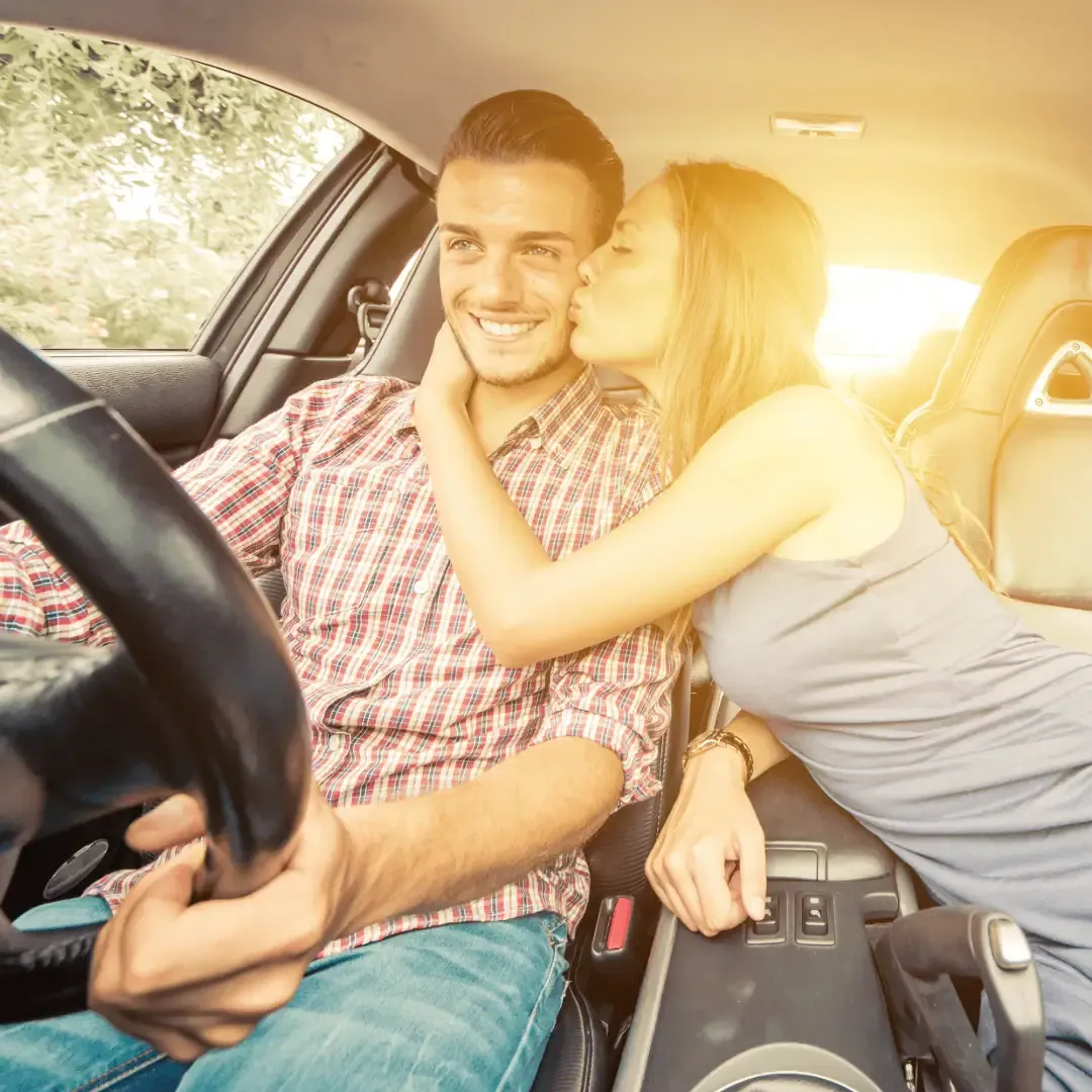 Test driving a used car to assess brakes and engine performance